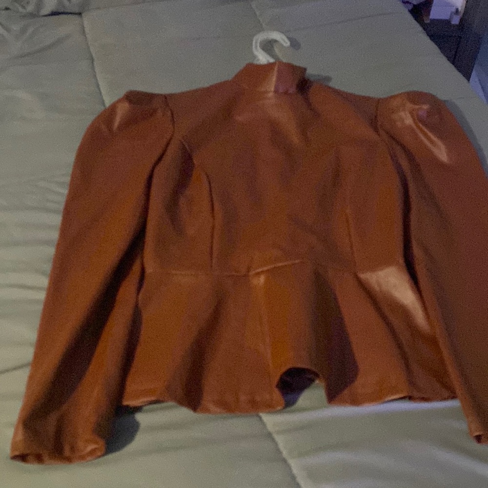 Faux leather top-size small but runs big.